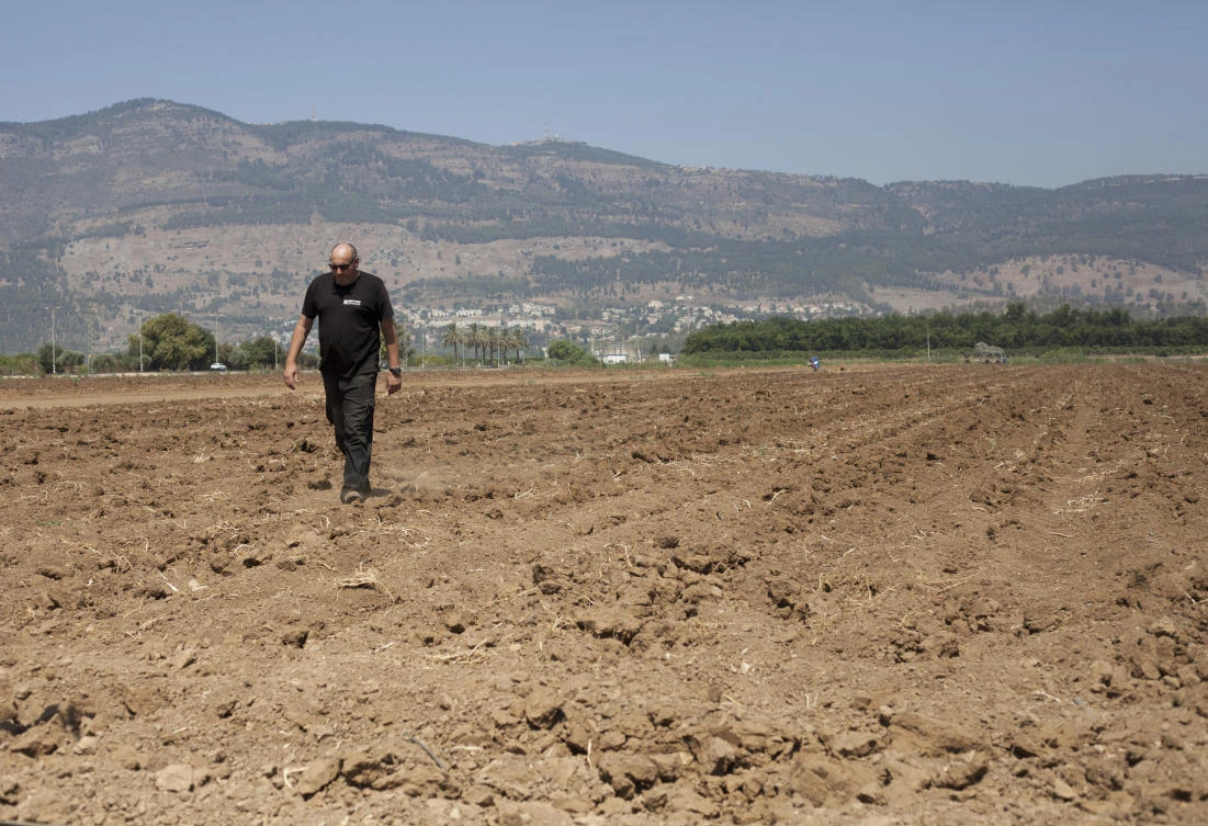 With farmers reeling from parched fields and the country's most important bodies of water shrinking, Israel once again is having to cope with a stifling lack of water despite professing to have tackled the issue. (File photo: Caron Creighton/AP)