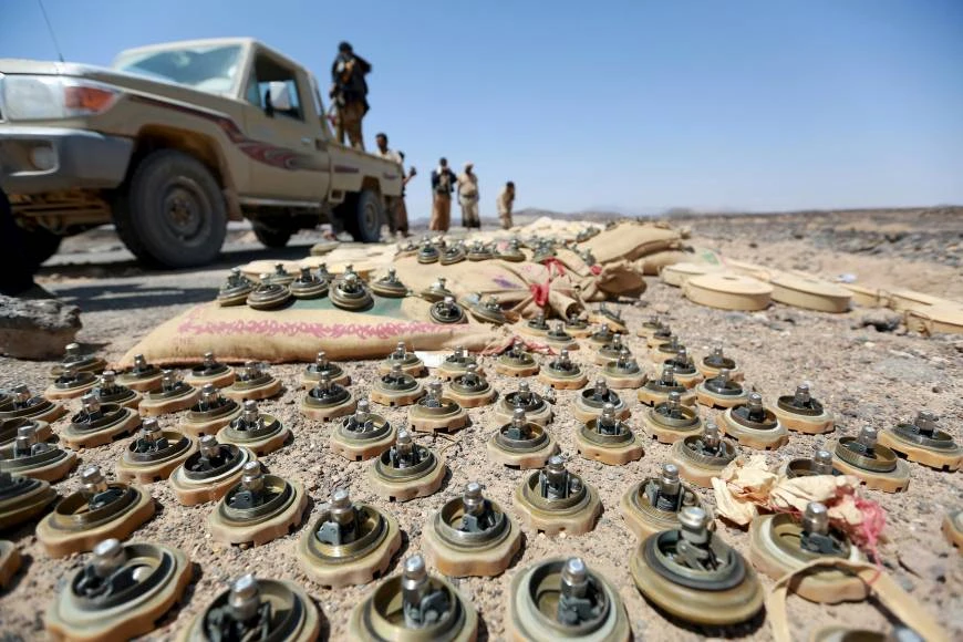 Soldiers loyal to Yemen's government stand next to mines planted by the Houthi group in locations where they controlled in front line in the province of Marib. (File photo: Reuters)