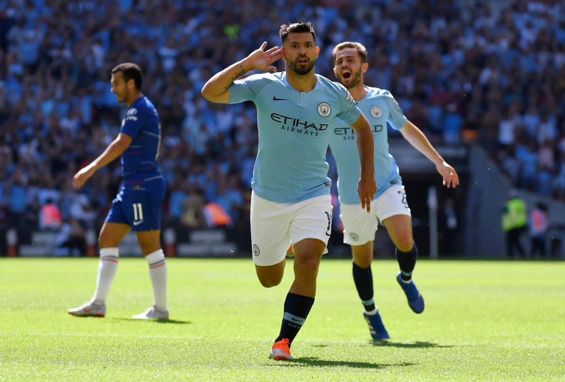 Sergio Aguero celebrates scoring the first of his two goals against Chelsea at Wembley. (Reuters)
