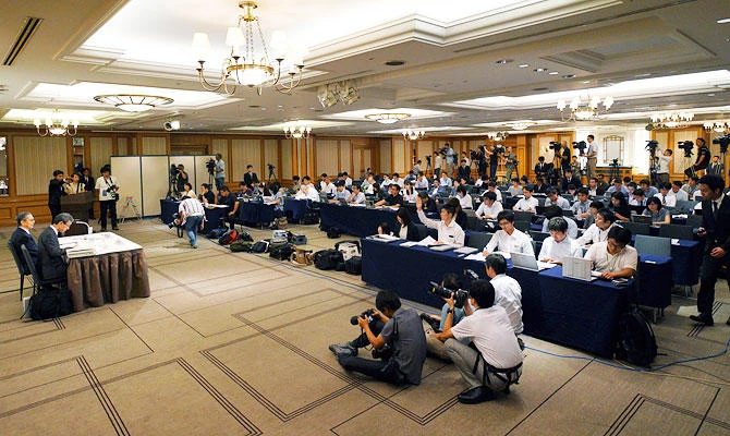 Internal investigation committee members hold a press conference on an investigation on fraud into its admissions process of Tokyo Medical University in Tokyo Tuesday, Aug. 7, 2018. (AP)