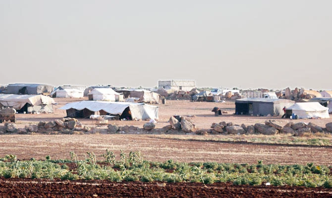 Photo taken on July 30 shows a view of tents at a refugee camp for the internally displaced Syrians in Idlib province. (Reuters)
