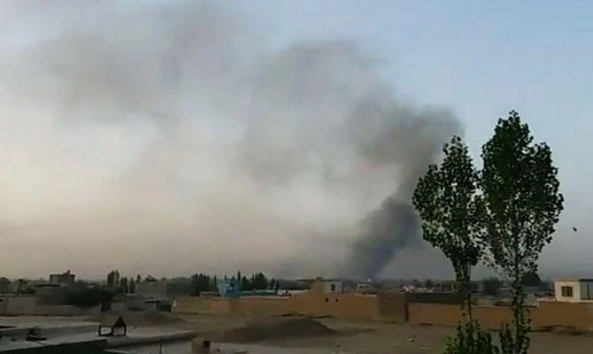 This screen grab taken from AFPTV video on August 10, 2018 shows smoke rising into the air after Taliban militants launched an attack on the Afghan provincial capital Ghazni, with terrified residents cowering in their homes amid explosions and gunfire. (AFP)