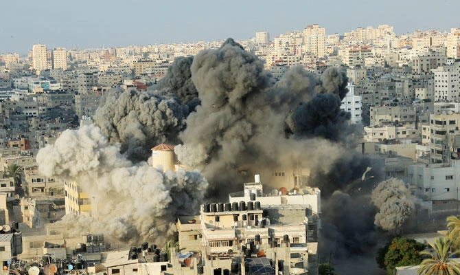 Smoke rises from an explosion caused by an Israeli airstrike on a building of Said al-Mis'hal cultural center in Gaza City, on Thursday, Aug. 9, 2018. (AP)