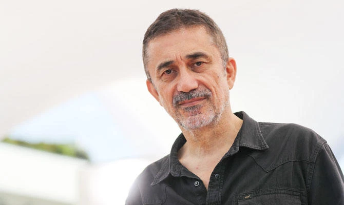 In this file photo taken on May 19, 2018 Turkish director Nuri Bilge Ceylan poses during a photocall for the film "The Wild Pear Tree (Ahlat Agaci)" at the 71st edition of the Cannes Film Festival in Cannes, southern France. (AFP)