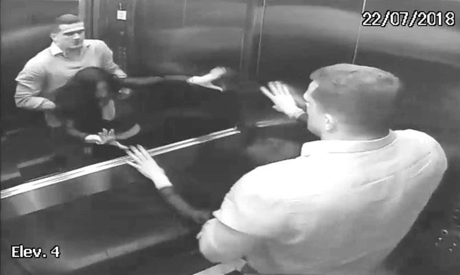Grab taken from a handout video captured by security cameras on July 22, 2018 and released by the Parana State Court, showing Brazilian Luis Felipe Manvailer assaulting his wife Tatiane Spitzner in a lift at their apartment in the town of Guarapuava, in the Brazilian southern state of Parana, a case that has shocked Brazil. (AFP)