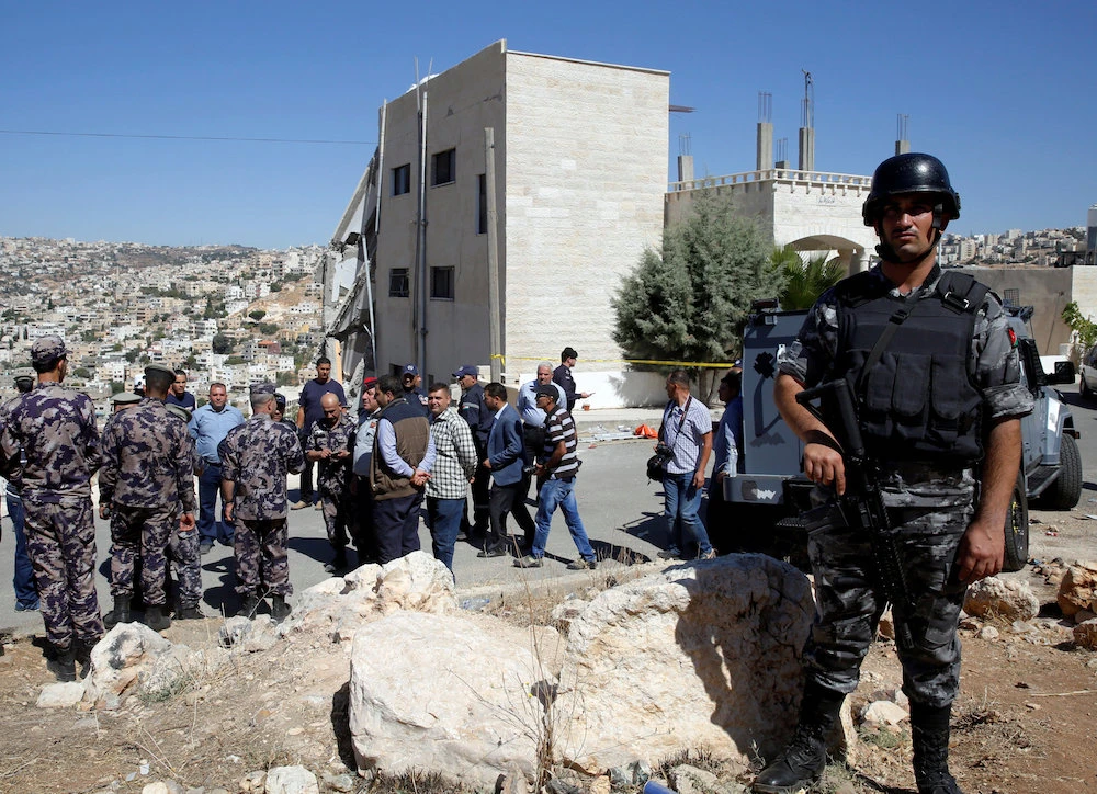Jordan king vows to defeat terrorism after militant shoot-out