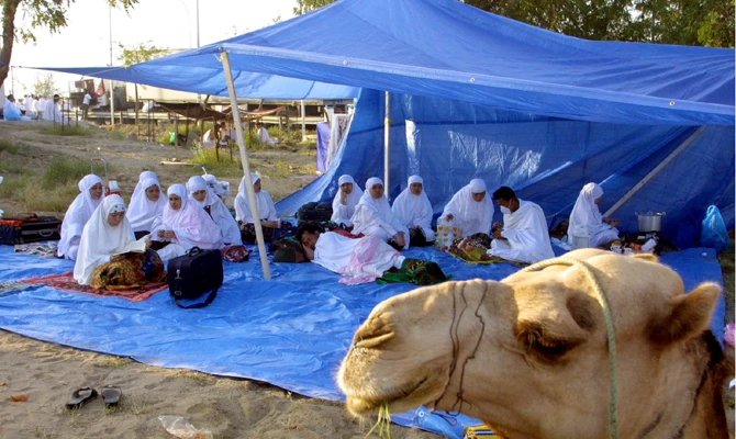 In this file photo, Indonesian Muslim pilgrims sit in a tent at Mount Arafat in Makkah, Saudi Arabia. Saudi King Salman is hosting this Hajj 40 pilgrims from Indonesia, some of them women. (AFP file)