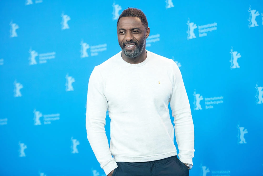 A cryptic tweet by British actor, director and executive producer Idris Elba's as poses has fueled speculation on Sunday that he may be named the first black James Bond, with a cryptic tweet. (AFP file photo)
