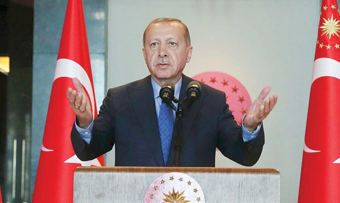 President Recep Tayyip Erdogan delivers a speech to Turkish ambassadors Monday. (AP)