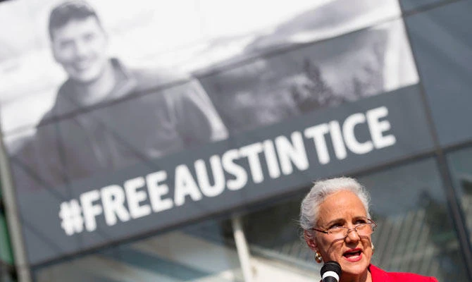 In this file photo taken on November 02, 2016 Debra Tice speaks about her son Austin Tice, the only US journalist held captive in Syria, during the unveiling of a new banner calling for his release at the Newseum in Washington, DC. (AFP)