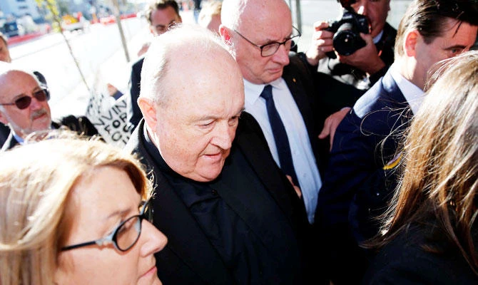 Australian archbishop begins home detention over sex abuse cover-up