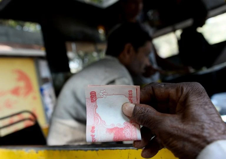 Indian rupee hits record low of 70 to the dollar