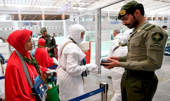 Muslim pilgrims arrive at Jeddah airport on August 14, 2018, prior to the start of the annual Hajj pilgrimage in the holy city of Makkah. (AFP)