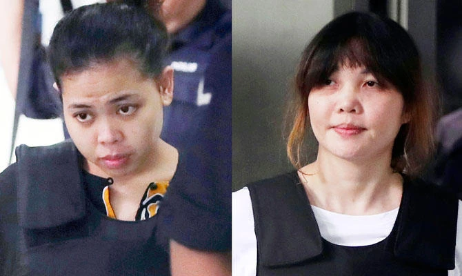 This combination of the Oct. 2, 2017 file photos shows Indonesian Siti Aisyah, left, and Vietnamese Doan Thi Huong, right, escorted by police as they leave a court hearing in Shah Alam, Malaysia, outside Kuala Lumpur. (AP)