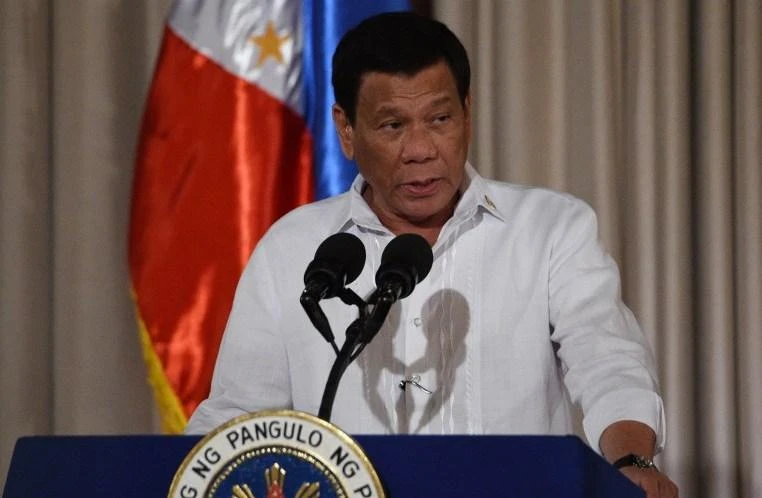 In a change of tone, Philippine President Rodrigo Duterte said in a speech late Tuesday to business entrepreneurs that China had no right to claim airspace above man-made islands. (AFP)