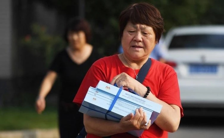 Relatives had earlier this month expressed frustration that the long-awaited official report — totaling some 1,500 pages — had no new clues about the missing airliner and had not been translated into Chinese. (AFP)