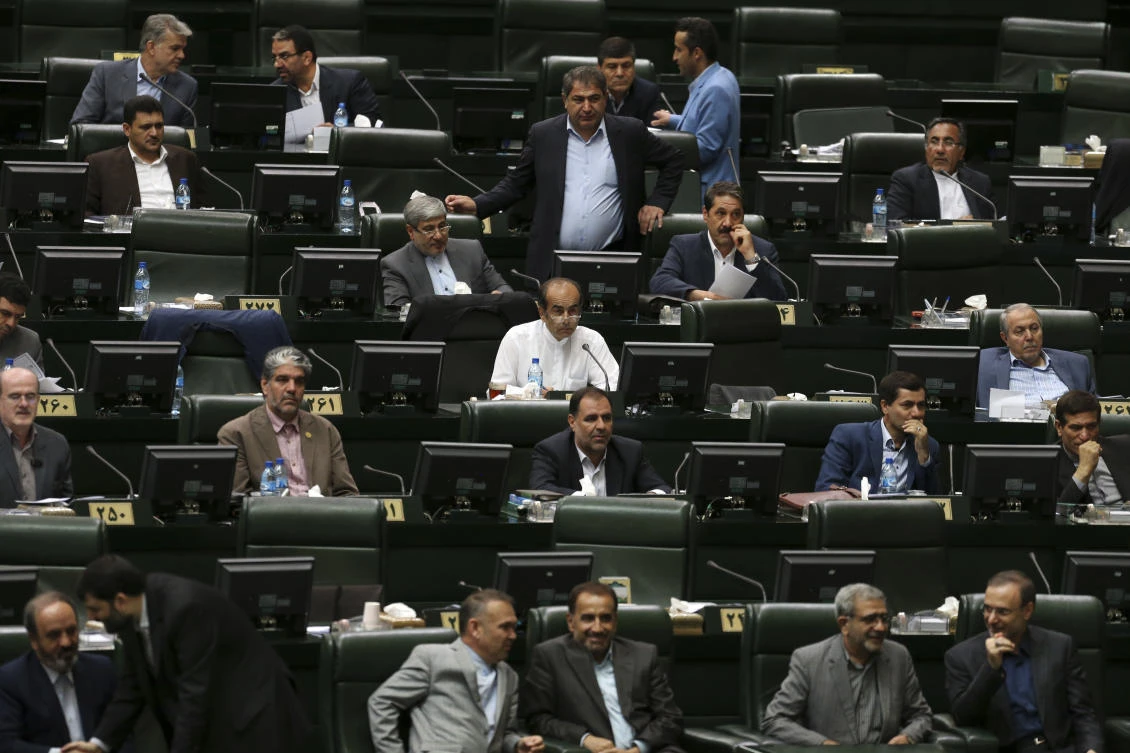 Hard-liners in parliament have opposed legislation aimed at moving toward compliance with FATF standards. (AP/Vahid Salemi)