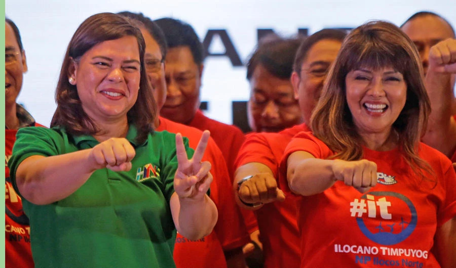 Davao City Mayor Sara Duterte-Carpio (L) and Ilocos Norte Governor Imee Marcos gesture during an alliance meeting with local political parties in Manila on August 13, 2018. *REUTERS/Czeasar Dancel)
