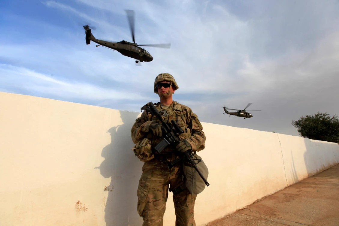 The spokesman said US troops would remain in Iraq for as long as they were required. (Reuters/Alaa Al-Marjani /File)