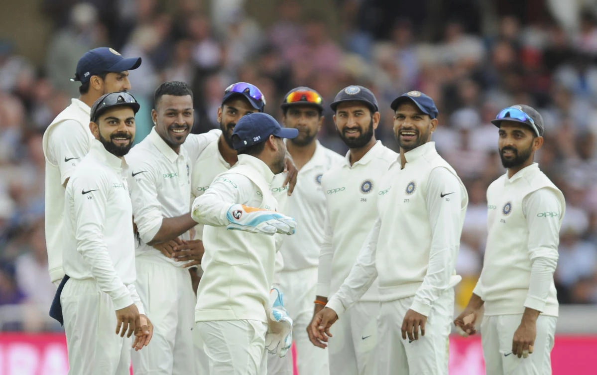 India's Hardik Pandya, without cap, stands with teammates during the second day of the third cricket test match between England and India at Trent Bridge in Nottingham, England. (AP)