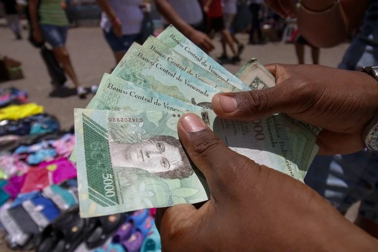 The new Venezuelan currency will be called the sovereign bolivar — to distinguish from the current, and ironically named strong bolivar, above. (AFP)