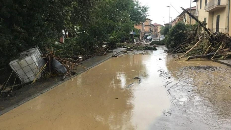 Eight hikers lost their lives when a mountain stream suddenly flooded in the southern Italian region of Calabria. Above, Five people died when Livorno, Tuscany, was hit by floods last year. (AP)