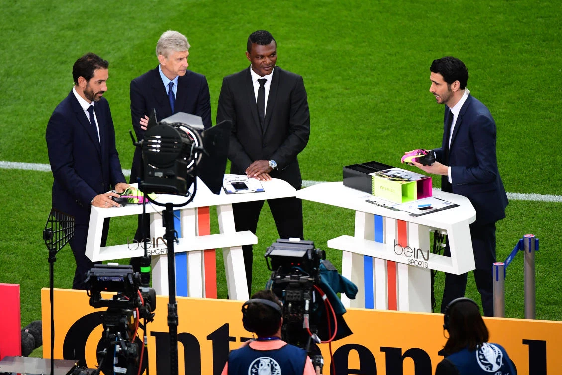 The beIN Sports team of (left to right) Robert Pires, Arsene Wenger, Marcel Desailly and Alexandre Ruiz at the Stade de France in 2016. (Getty Images)