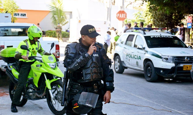Police officers stand guard next to the area after an attack on the Station of the District San Jose, in Barranquilla, Colombia, in this January 27. 2018 file photo. (REUTERS)
