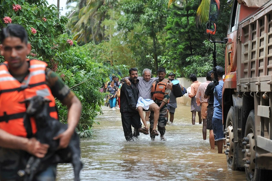 The death toll is close to 400 and rising, but there are also hundreds of thousands of people who have been evacuated, while others are yet to be reached by rescue crews. (AFP/Files)