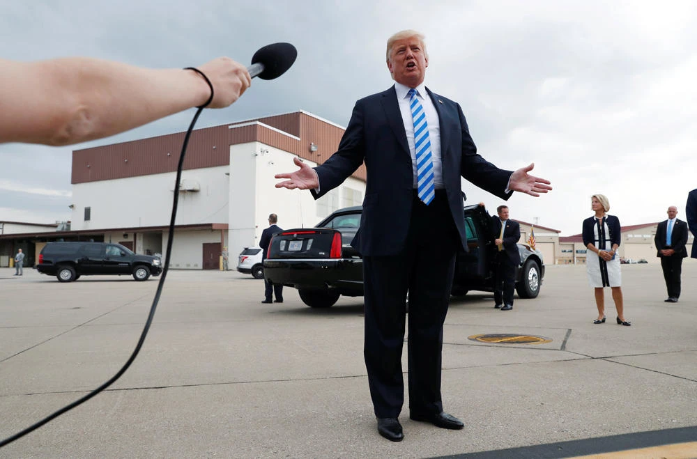 Silent on Cohen, Trump says Manafort conviction ‘a disgrace’ but ‘does not involve me’
