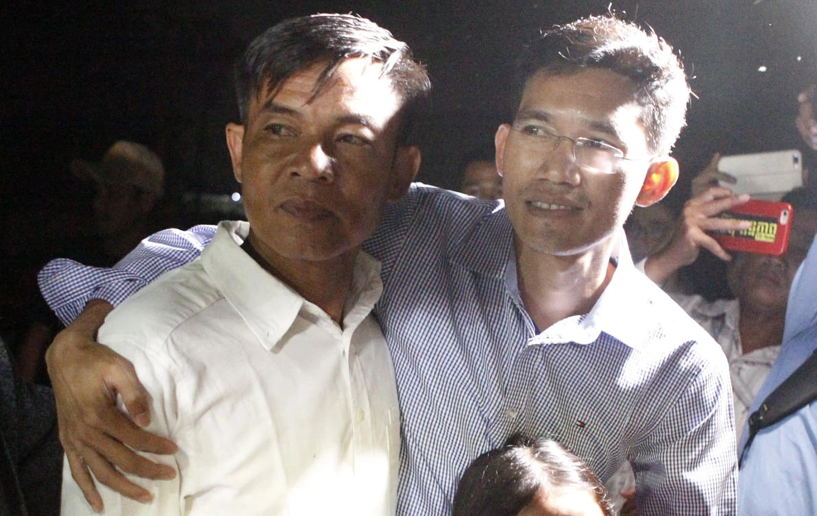 Former Radio Free Asia reporters Uon Chhin, left, and Yeang Socheamet face possible prison terms of up to 15 years after being charged with espionage. (AP)