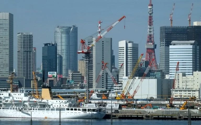 Japan’s roughly 100 regional banks are grappling with diminishing returns from their traditional lending business. (AFP)