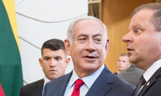 Lithuania's Prime Minister Saulius Skvernelis, right, and Israel's Prime Minister Benjamin Netanyahu speak, prior to their meeting at the government's headquarters in Vilnius, Lithuania, Thursday, Aug. 23, 2018. (AP)