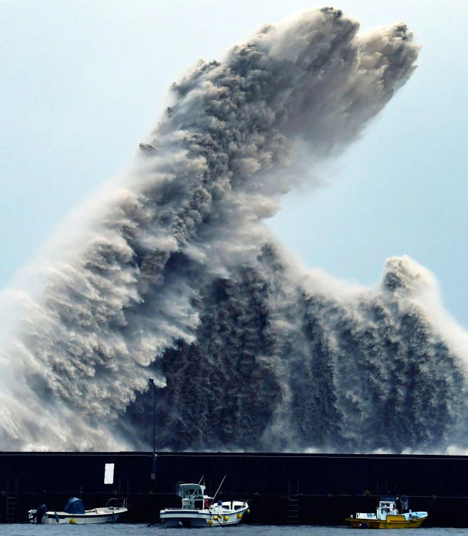 High wave hits a breakwater in Aki city, Kochi prefecture, western Japan as a typhoon Cimaron approached the area. (AP)
