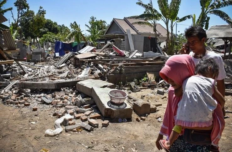 Some 390,000 people remain displaced after the quakes, Indonesia’s disaster agency said. (AFP)