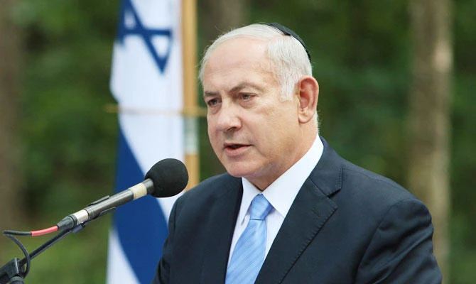 Israel's Prime Minister Benjamin Netanyahu speaks during a remembrance ceremony at the Paneriai Holocaust Memorial near Vilnius, on Friday, August 24, 2018. (AFP)
