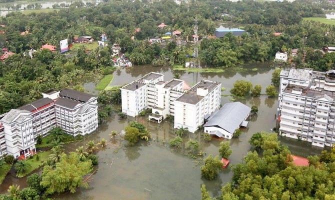 An aerial view shows partially submerged buidlings at a flooded area in the southern state of Kerala, India, August 19, 2018. (REUTERS)