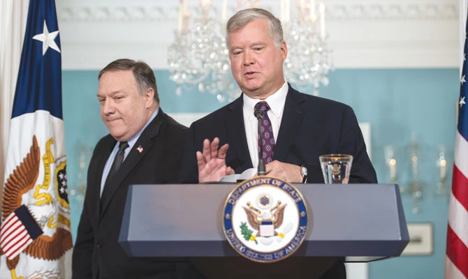 New US special representative to N. Korea Steve Biegun and US Secretary of State Mike Pompeo speak to the press in Washington, DC, on Thursday. President Donald Trump said Pompeo’s visit to N. Korea would likely occur when the US-China trading relationship is resolved. AFP