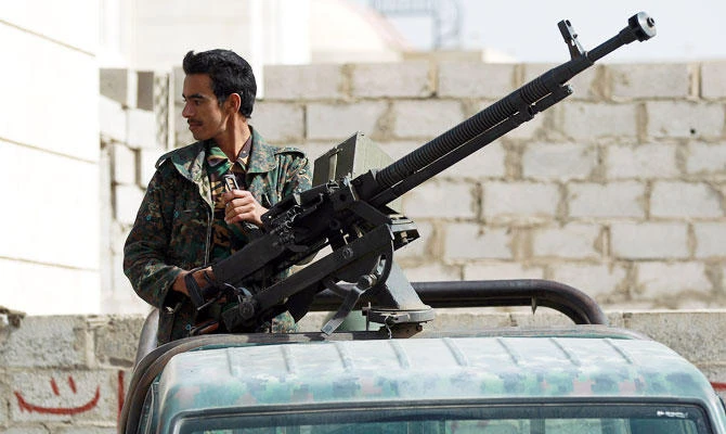 Yemeni security member stand guard in the Yemeni capital Sanaa. (AFP file photo)