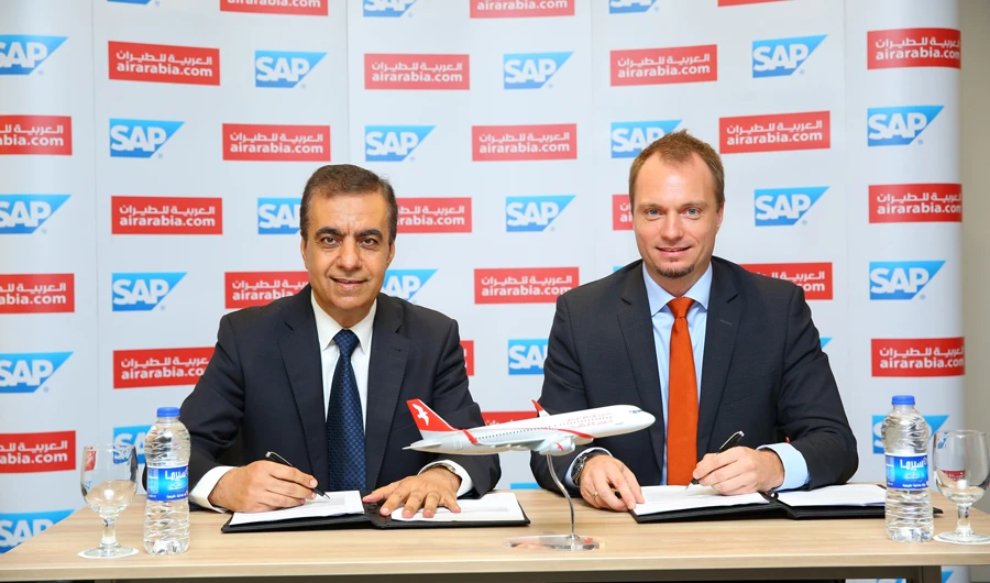 Adel Al-Ali, CEO of Air Arabia, and Julien Bertin, MD of SAP, at the signing ceremony.