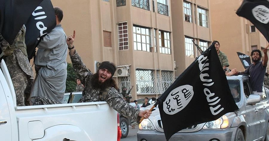 The proclamation was made with great fanfare as extremists drove bulldozers across the Syrian-Iraqi border. (File/AFP)