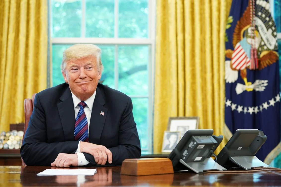 US President Donald Trump listens during a phone conversation with Mexico's President Enrique Pena Nieto on trade in the Oval Office of the White House. (AFP)