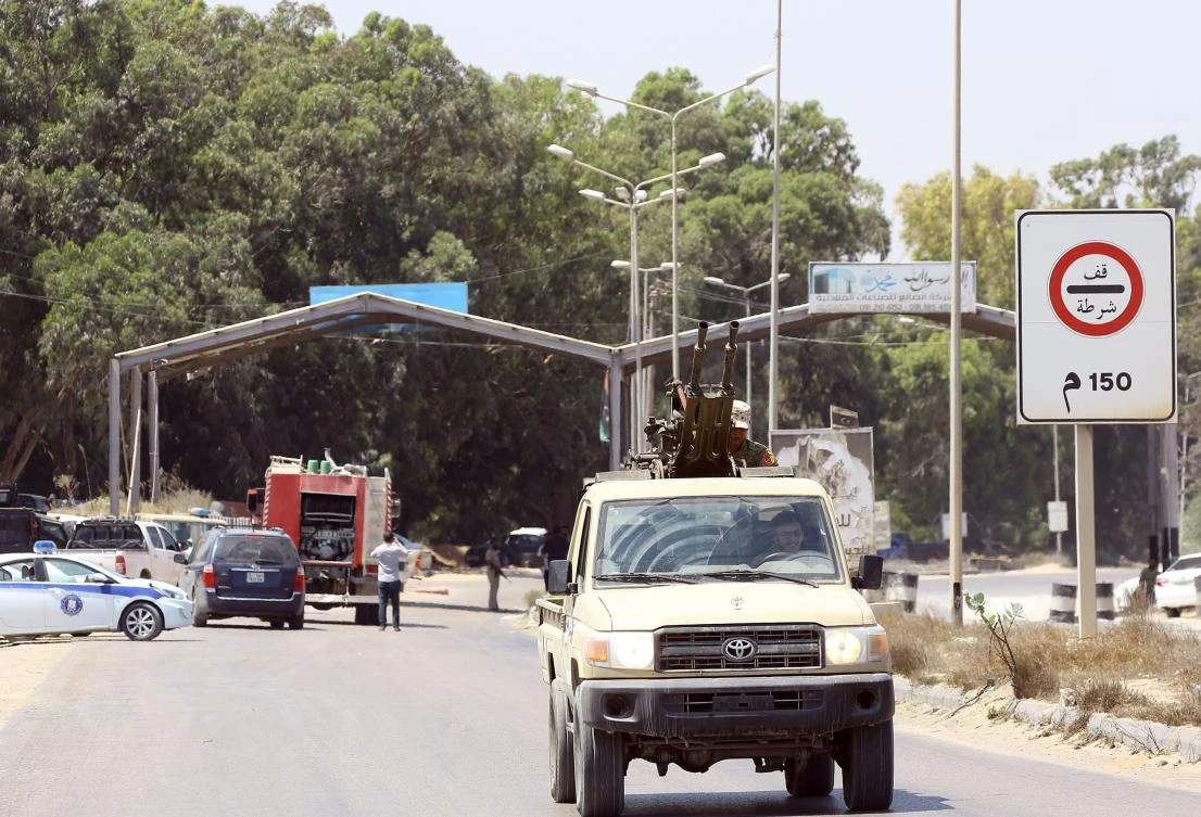 Libyans security patrol on August 23, 2018 near the site of an attack on a checkpoint in the city of Zliten, 170 km east of the capital Tripoli. (AFP)