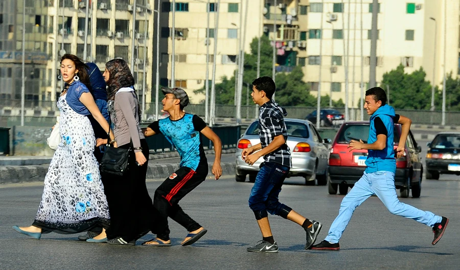 The divisions have been highlighted by a recent debate over a video posted on the Internet by an Egyptian woman showing a man making unwanted advances on her in a Cairo street. (AP/El Shorouk Newspaper/File)