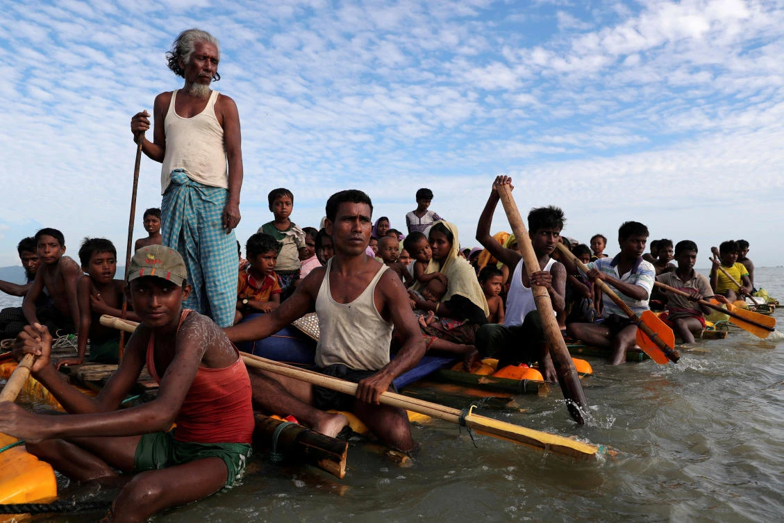 Rohingya refugees cross the Naf River with an improvised raft to reach to Bangladesh in Teknaf, Bangladesh, November 12, 2017. (File/Reuters)