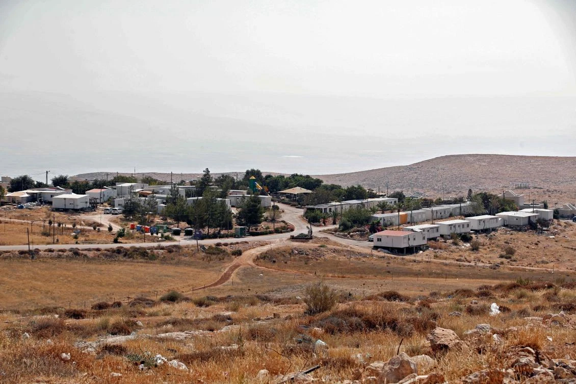 An Israeli court has for the first time recognized as legal a settlement established on privately owned Palestinian land in the occupied West Bank, court officials said yesterday. (AFP)