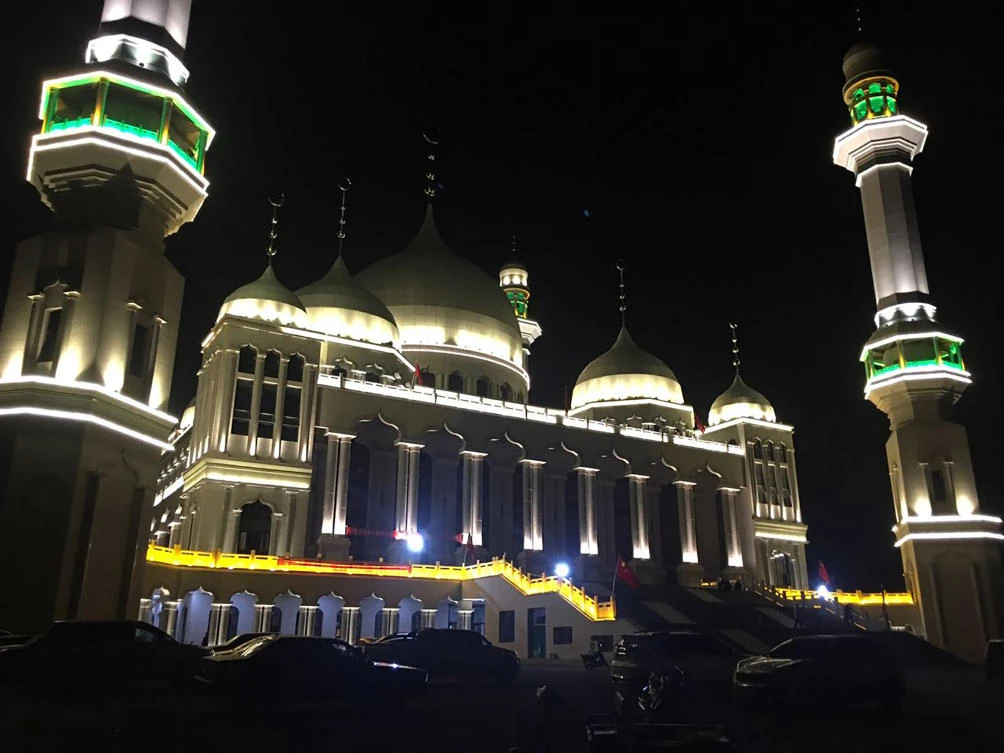 China blames local officials for protest over mosque razing