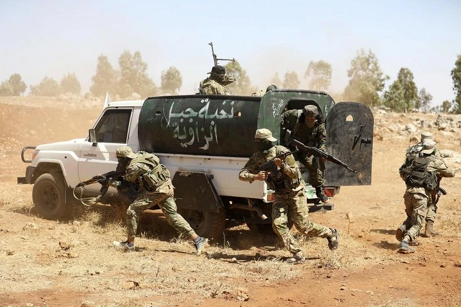 HTS has consistently been excluded from cease-fires negotiated by the United Nations or Russia. (File/AFP)