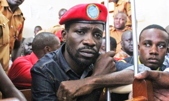 Ugandan opposition pop star flies to US for treatment