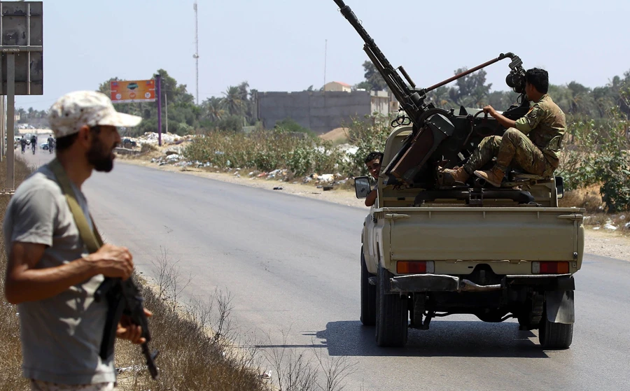 Libyans security forces patrol near the site of an attack on a checkpoint in the city of Zliten, 170 km east of Tripoli. (AFP/file)